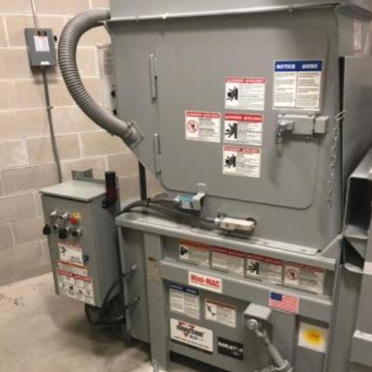 Equipment detail _ Apartment Trash Compactors-1 cra gray apartment trash compactor