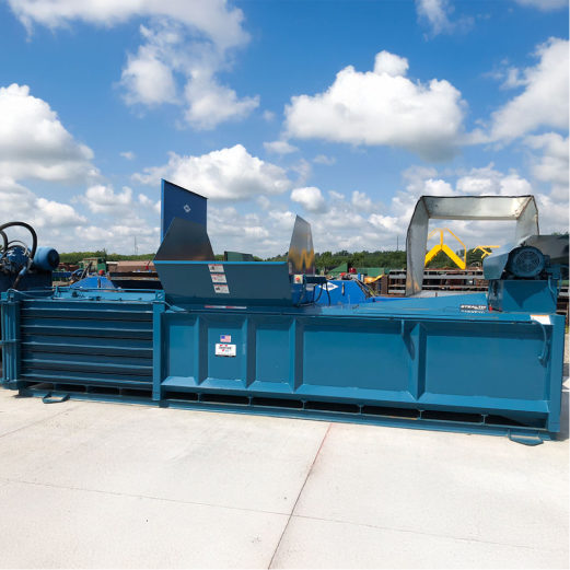 HBaler_03 CRA blue horizontal baler outside in construction site
